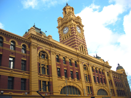 Flinders Street Train Station in Melbourne on a bright sunny day.